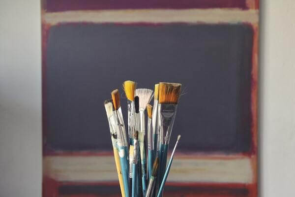 paint brushes and canvas