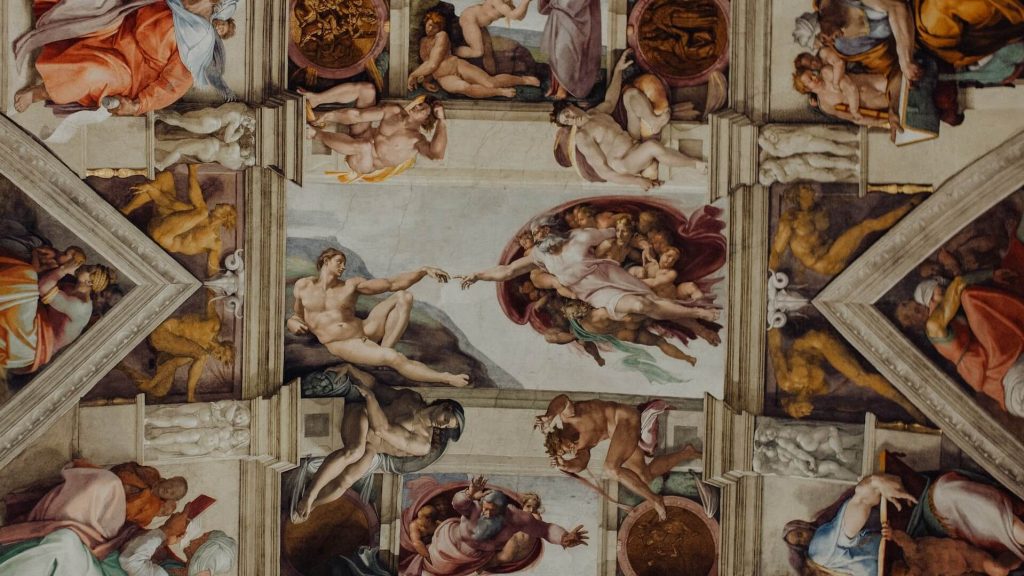 A view of the exquisite artwork adorning the ceiling of the Sistine Chapel, created by Michelangelo.